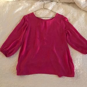 Pink top with bow on the back